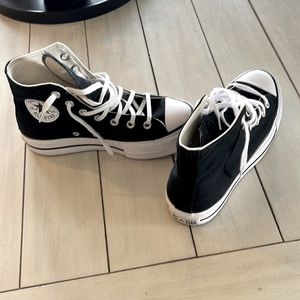 Black and white Converse platforms. Worn one time and in great condition